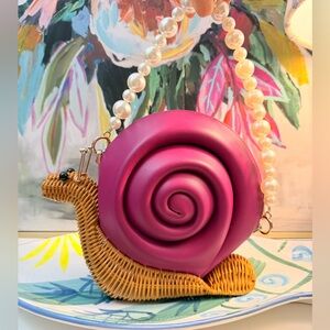 Kate Spade Pink Snail Wicker Crossbody
Bag Enchanted Forest
